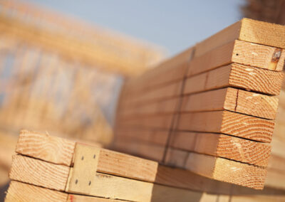 Stack of Building Lumber at Construction Site with Narrow Depth of Field.
